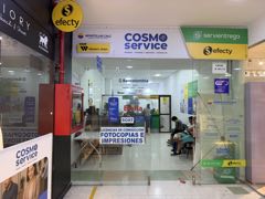 Fachada de nuestra oficina en el Centro Comercial Cosmocentro, Local A 101-13, con los avisos de Apostillas Cali y Cosmo Service.